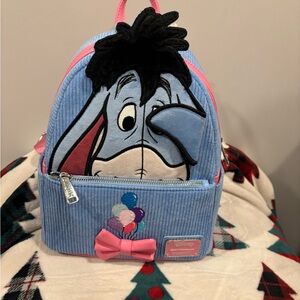 Loungefly Disney Eeyore Backpack in Blue and Pink